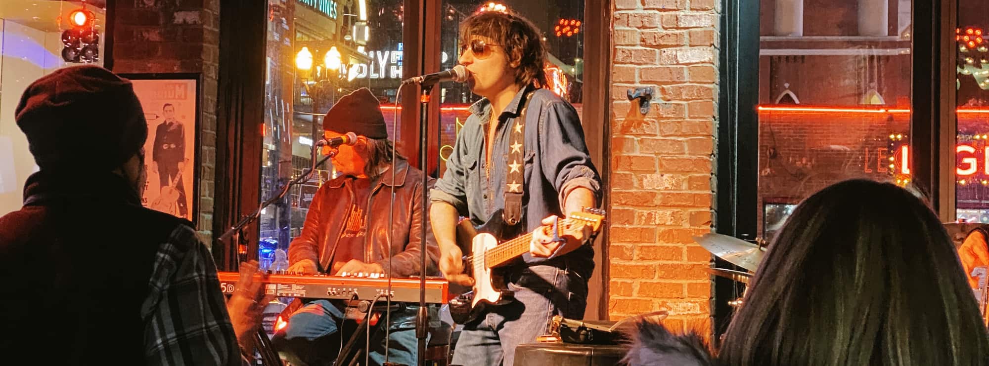 bar singer on guitar in Portland